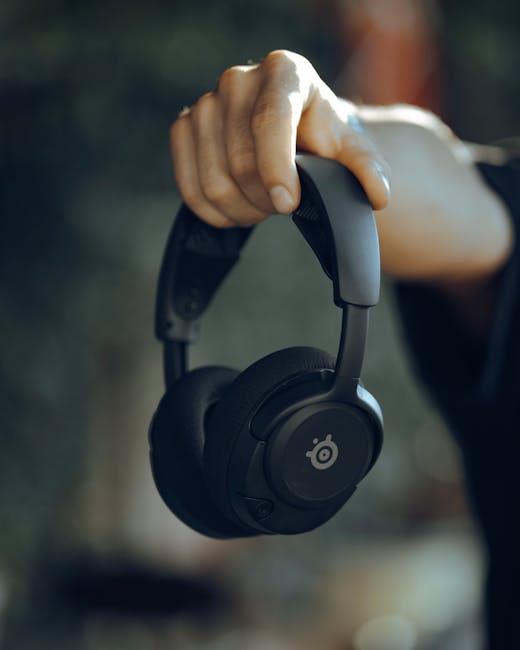 Person listening intently to audio with quality headphones on